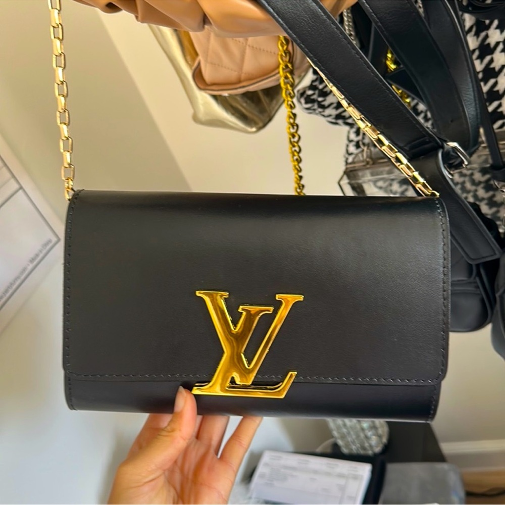 LV BLACK AND GOLD BAG